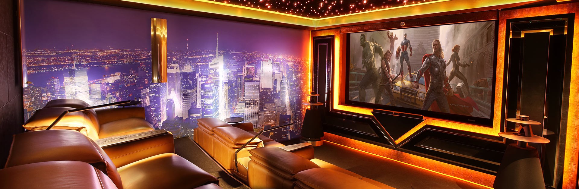 Home theatre room with StarEFX ceiling, cove lighting, a large movie screen, lounges, and a bar