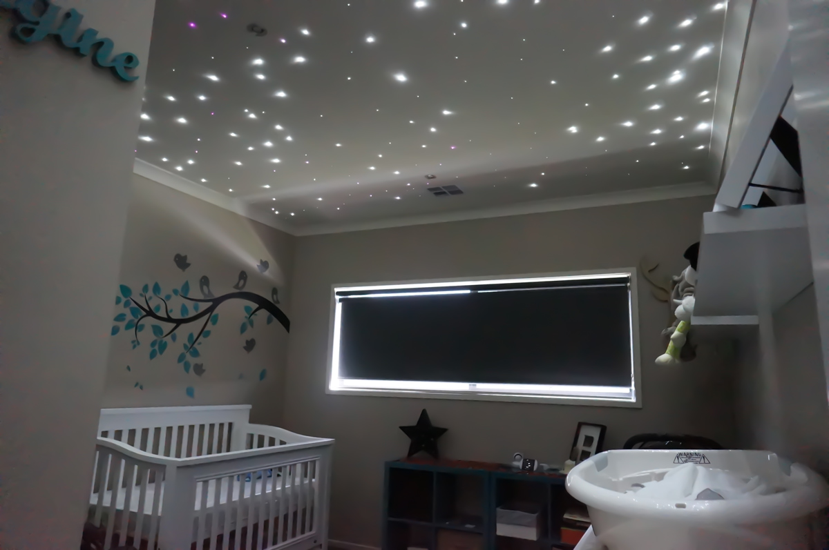 nursery with StarEFX ceiling panels white Colored Lights