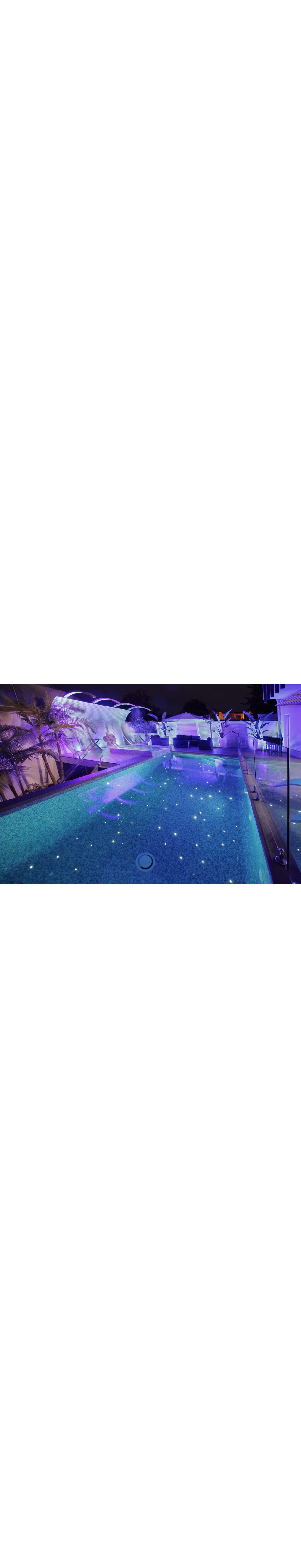 a pool with purple lights