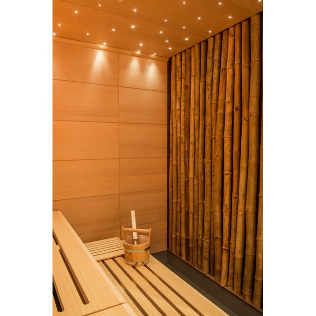A luxurious sauna featuring a StarEFX™ ceiling, with a calming display of gently shimmering starlights.