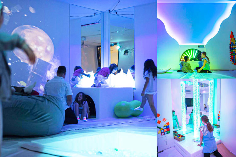 Children's Sensory Room with Interactive lighting and StarEFX Mirror Panel Interactive sensory room for children featuring soft cushions and StarEFX stainless steel mirror-finish panel