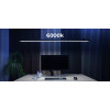LightEFX Shift desk light set to 6000K daylight color temperature over a workstation