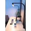 LightEFX Shift desk light clamp mount attached to desk edge showing adjustable arm and light head