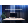 LightEFX Shift tunable white desk light illuminating a modern workstation with monitor, keyboard and plant