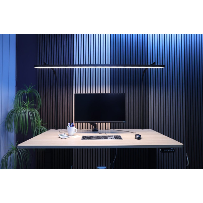 LightEFX Shift tunable white desk light illuminating a modern workstation with monitor, keyboard and plant