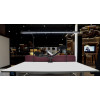 LightEFX Shift desk light showroom display spanning a white desk with monitor arm setup